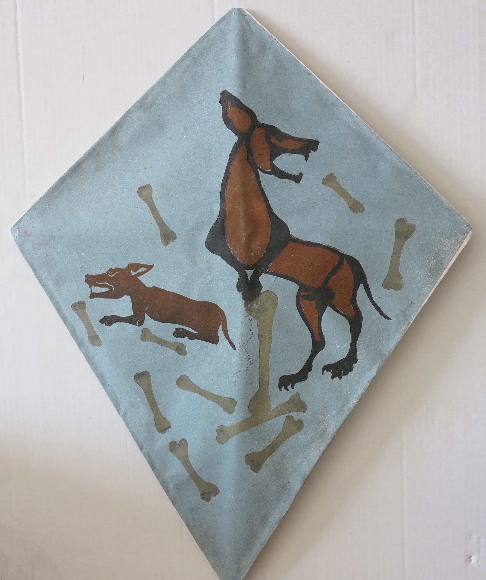 Abstract dog kite, with bone by Francisco Toledo